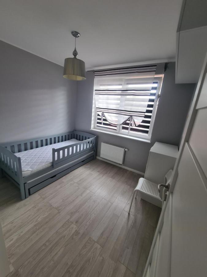 Apartament Rodzinny Z Ogrodkiem กดัญสก์ ภายนอก รูปภาพ